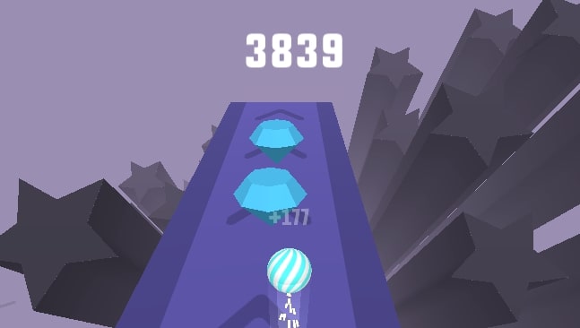 Players need to collect gems, but don't forget that you are playing the game because of collecting gems, fall down the cliff and end the game in Flying ball game at Yoplay.io